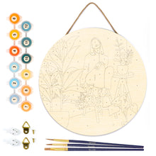Load image into Gallery viewer, Paint by numbers on Wood Slice - Woman in the room with plants