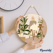 Load image into Gallery viewer, Paint by numbers on Wood Slice - Woman in the room with plants